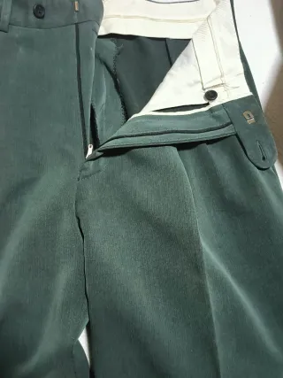 Traje de chaqueta verde oscuro