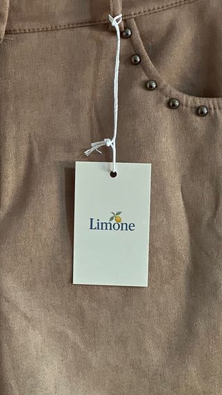 Conjunto saia e colete com tachas Nov- chegada