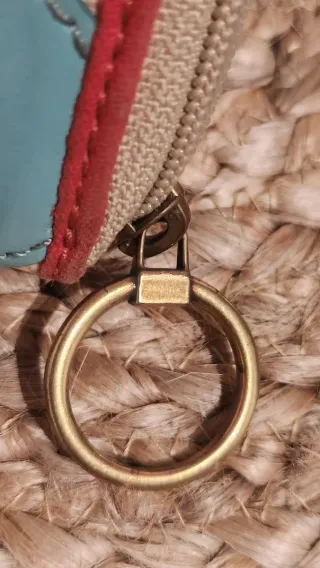 Cartera Fossil beige, turquesa y roja