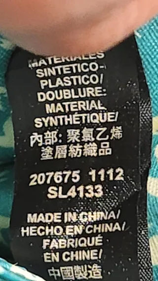 Cartera Fossil beige, turquesa y roja