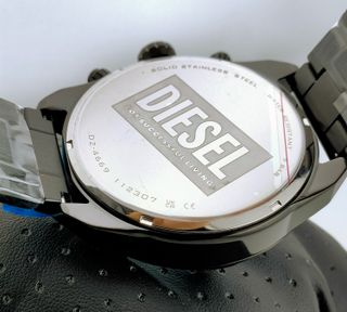 Reloj Diesel Spiked nuevo, negro y dorado