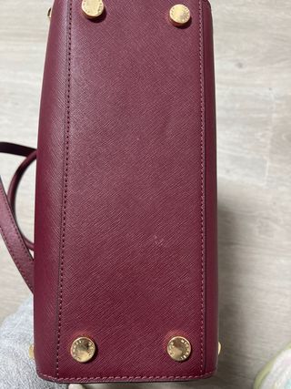 Bolso Michael Kors con tachuelas doradas