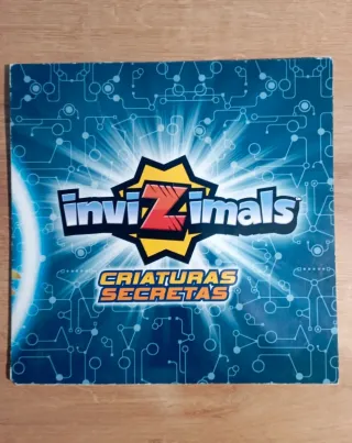 Álbum Invizimals vacío + revista + juego de cartas