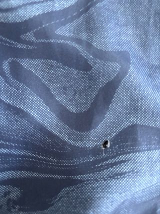 Casaco com capuz estampado