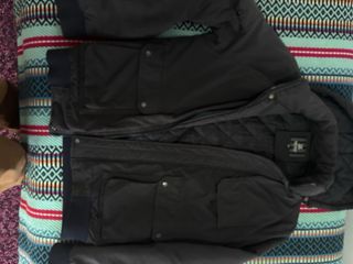 Casaco cinzento e castanho