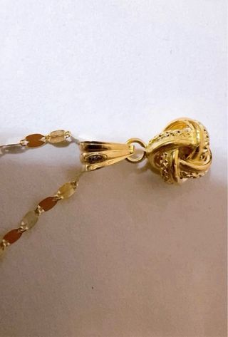 Collana con ciondolo nodo in oro 18kt 750