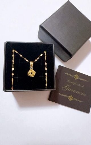 Collana con ciondolo nodo in oro 18kt 750