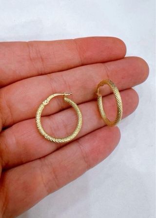 Orecchini a cerchio pitonati in oro giallo 18kt