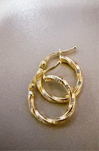 Orecchini cerchio  modello torchon in oro 18kt