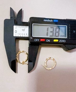 Orecchini cerchio  modello torchon in oro 18kt