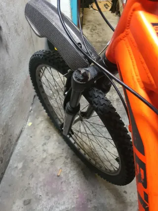 2 Bicicletas Rockrider Naranja y otra en negro