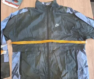 Giacca a vento Nike grigia e blu