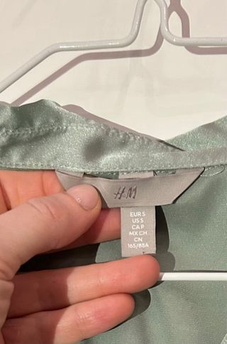 Blusa de H&M en color verde agua. Talla S mujer