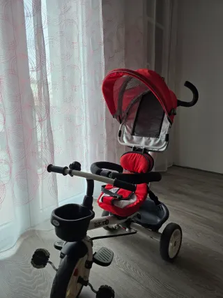 Triciclo infantil rojo y blanco