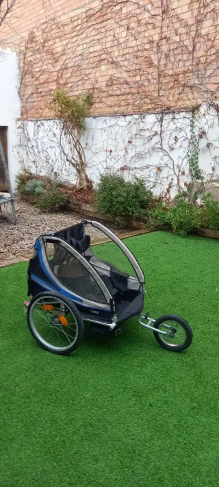 Remolque bici 2 niños con amortiguación