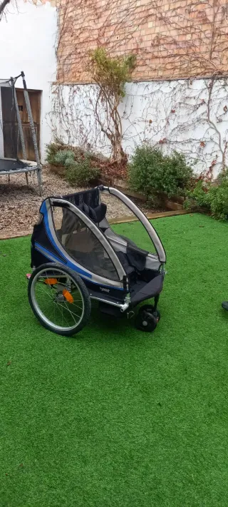 Remolque bici 2 niños con amortiguación