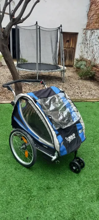 Remolque bici 2 niños con amortiguación
