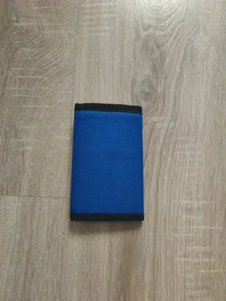 Cartera azul regaló cn una compra de mi perfil,