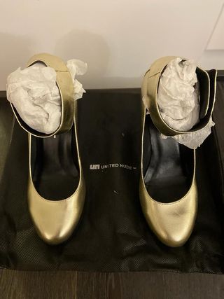 Scarpe United Nude oro con cinturino