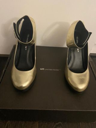Scarpe United Nude oro con cinturino