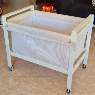 Minicuna con ruedas