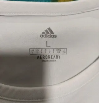 Camiseta deportiva Adidas blanca y negra