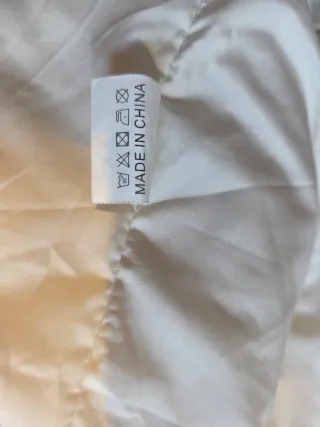 Abrigo pelo sintético acolchado beige/blanco