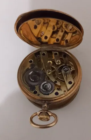 Reloj de bolsillo de oro 14k con querubín año 1890