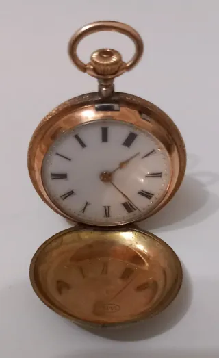 Reloj de bolsillo de oro 14k con querubín año 1890