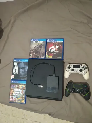 PS4 + 2 Mandos + 4 Juegos