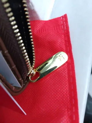 Billetera Carolina Herrera CH monograma