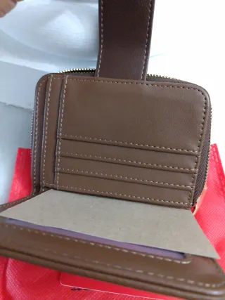 Billetera Carolina Herrera CH monograma