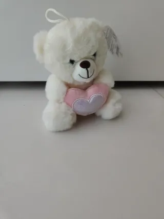 Orsacchiotto peluche bianco con cuore rosa