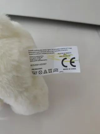 Orsacchiotto peluche bianco con cuore rosa