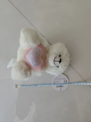 Orsacchiotto peluche bianco con cuore rosa