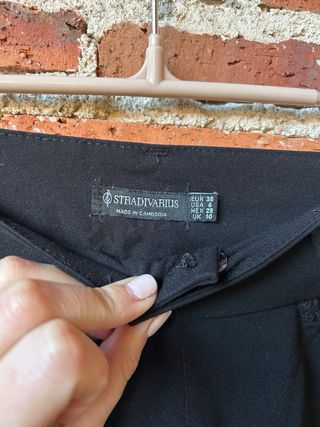 Pantalones negros acampanados TALLA 38