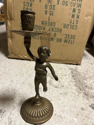 Candelabri in ottone con putto