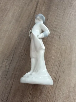 Figura de porcelana músico
