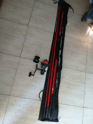 Caña de pescar tubertini con carrete okuma