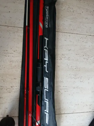 Caña de pescar tubertini con carrete okuma