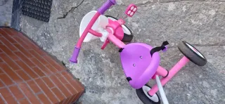 Triciclo rosa in alluminio.