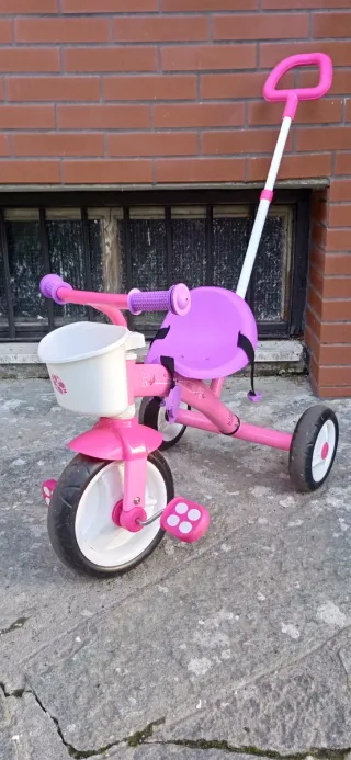 Triciclo rosa in alluminio.