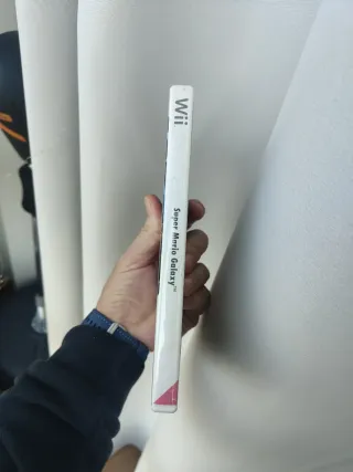 Lote de juegos y mando Wii