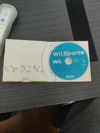 Lote de juegos y mando Wii