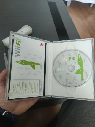 Lote de juegos y mando Wii