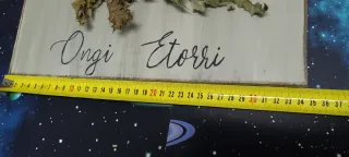 Eguzkilore artesanal sobre madera