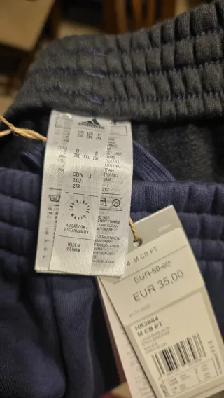 Pantalón chándal Adidas azul y blanco a rayas