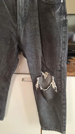 Jeans uomo grigi strappati taglia 48