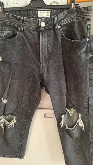 Jeans uomo grigi strappati taglia 48