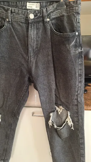 Jeans uomo grigi strappati taglia 48